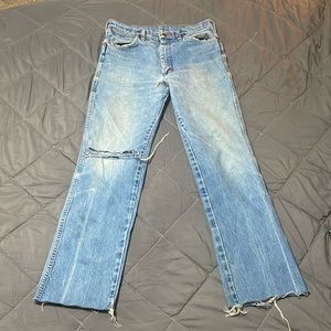 Wrangler jeans, heavily worn